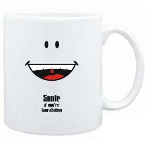   Mug White  Smile if youre law abiding  Adjetives