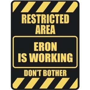   RESTRICTED AREA ERON IS WORKING  PARKING SIGN: Home 