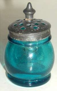 This is a beautiful old salt shaker, approximately 2 3/4 tall, up to 