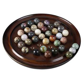Solitaire with 38 hand made marbles. Art in itself, functional and fun 
