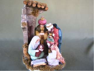 Unique Nativity Scene with Mary holding baby Jesus and the Wise Men 