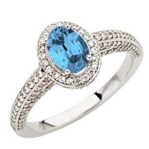 Super GEM Blue Aquamarine Gemstone sits in Nest of Diamonds on White 