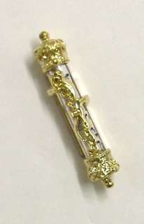 This elegant gold plated car mezuzah is a great way to brighten up 
