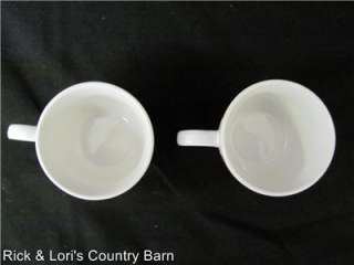 PAIR OF TEA OR COFFEE CUPS AND SAUCER WITH HEART DESIGN HOLDER 