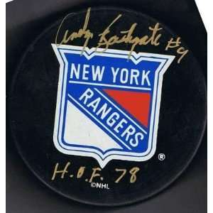  Andy Bathgate Autographed Puck   NY NHL HOF 78   Autographed NHL 