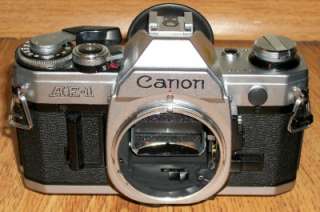 Canon AE 1 35mm Program SLR Film Camera + 70 210mm 50mm Lenses Vivitar 