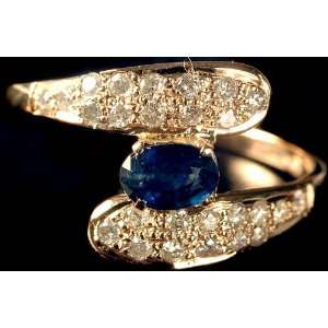  Fine Cut Sapphire Ring with Diamonds   18 K Gold 