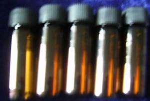 small AMBER GLASS BOTTLES secure CAPS Vials 1 dram  