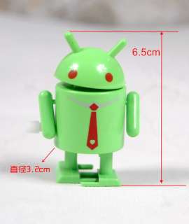 This bid for a pack of THREE Wind Up Toy   Walking Android Robot